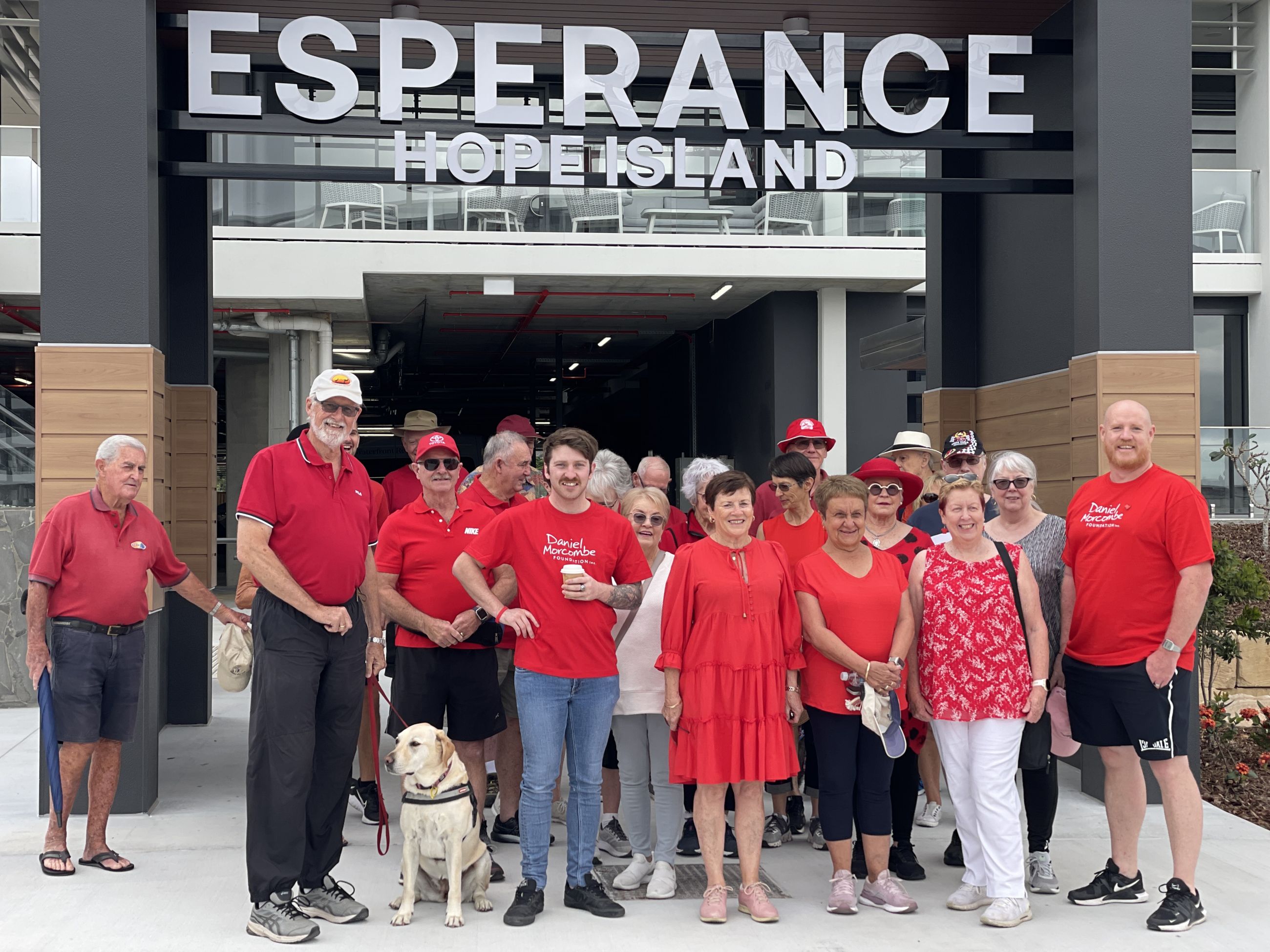 Group of Reside residents standing under the Esperance sign about to walk on the Day for Daniel walk.