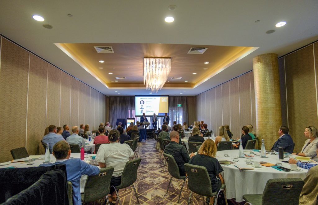 Crowd at the DCM Village Summit at the Rydges South Bank.